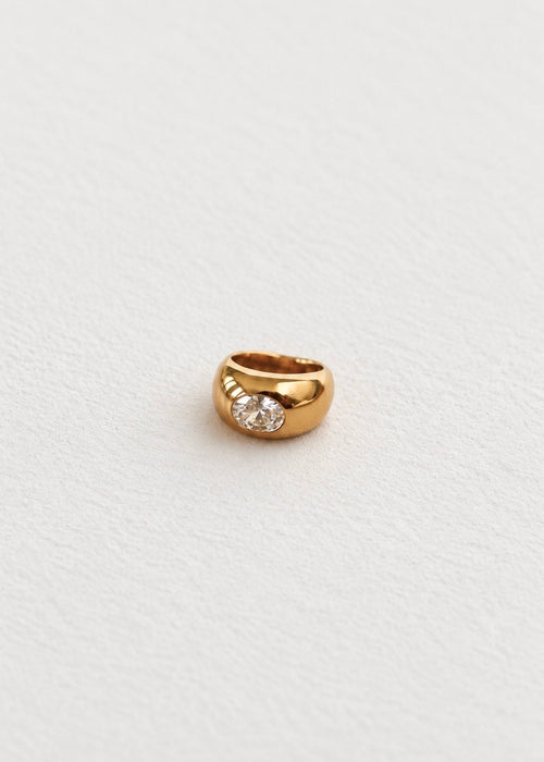 Grosse bague épaisse avec zircon central 