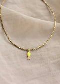 collier ipanema doré perlé fin avec charm poisson jaune discret